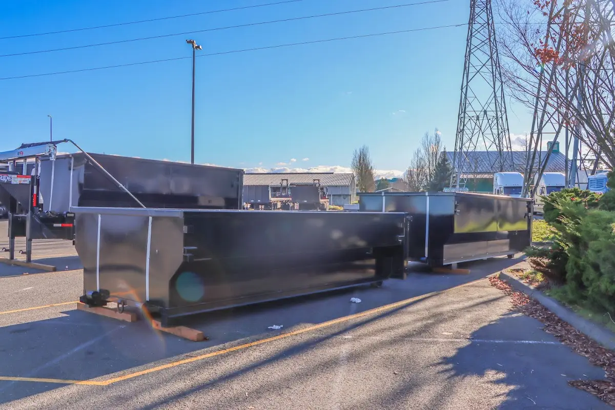 Roll-off dumpster ready for waste disposal at job site for 12 Yard Dumpster Rental in Powell